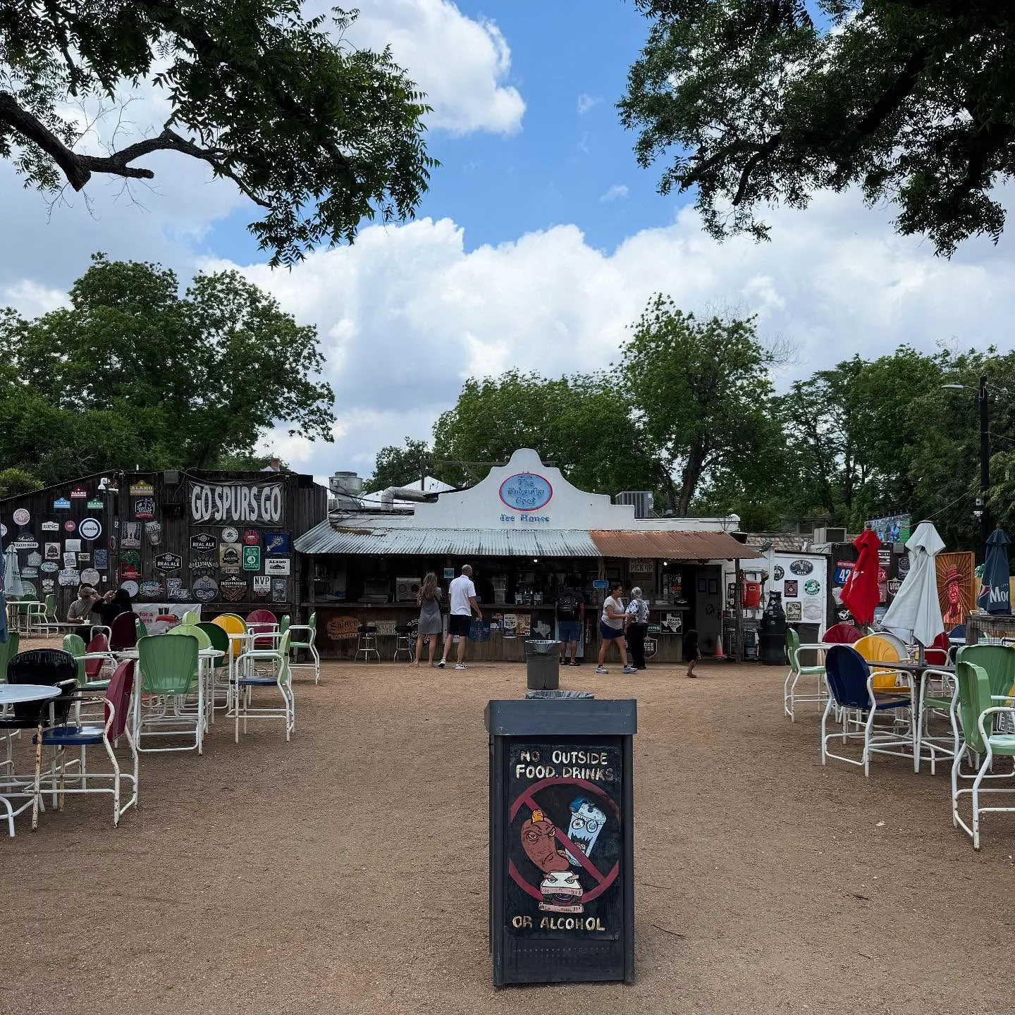 The Friendly Spot at night, packed with people