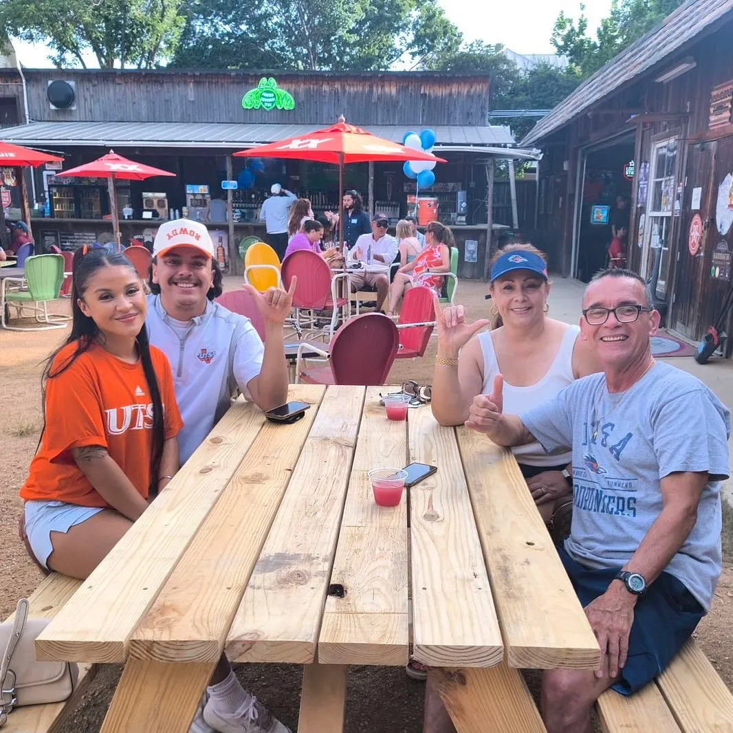 Guests enjoying the patio at The Friendly Spot